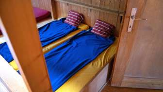 Einfache urchige Zimmer im Bergrestaurant
