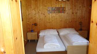 Schlafzimmer Ferienhaus Murmelegg